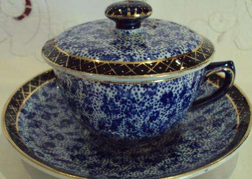 LATE 1800's LIDDED CUP AND SAUCER