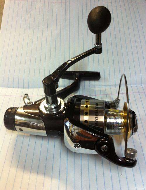 HUGE BARGAIN!!  CONOFLEX 5000 BAIT RUNNER WITH SPARE SPOOL!!( MADE BY RAPALA)