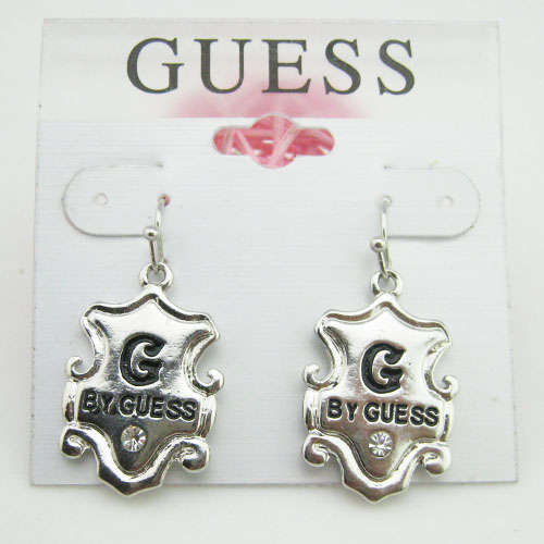 GUESS brand peach heart earrings special product.