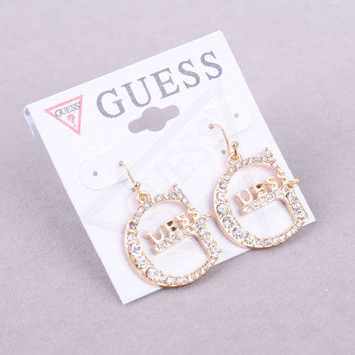 GUESS brand wild force sparkling crystal earrings.