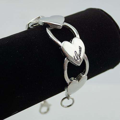 Absolutely original single polished beautifully Guess love bracelet.