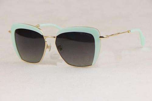 Brand new Miu Miu wild jade green fresh comfort sunglasses.