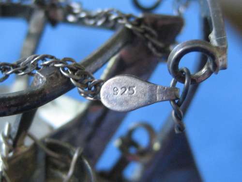Sterling Silver Model of an Arabian Dhow stamped 925 on Blue Felt Plinth