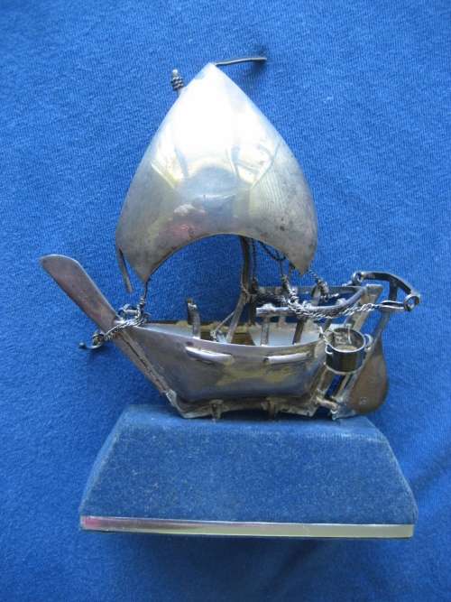 Sterling Silver Model of an Arabian Dhow stamped 925 on Blue Felt Plinth