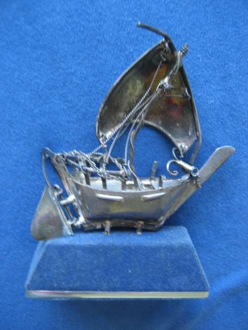 Sterling Silver Model of an Arabian Dhow stamped 925 on Blue Felt Plinth