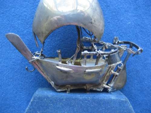 Sterling Silver Model of an Arabian Dhow stamped 925 on Blue Felt Plinth