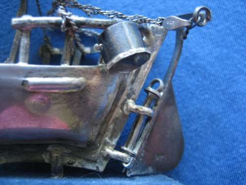 Sterling Silver Model of an Arabian Dhow stamped 925 on Blue Felt Plinth