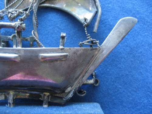 Sterling Silver Model of an Arabian Dhow stamped 925 on Blue Felt Plinth