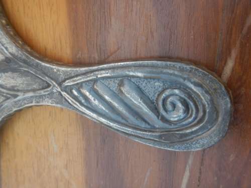 Antique pewter hand mirror