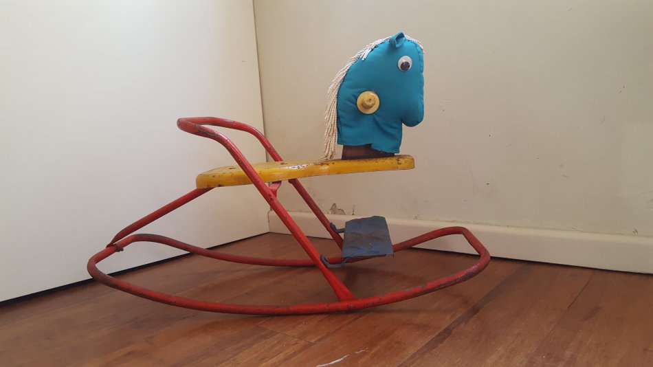 Vintage metal rocking horse
