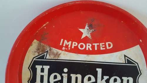 Decanter, vintage Heineken tray and optics