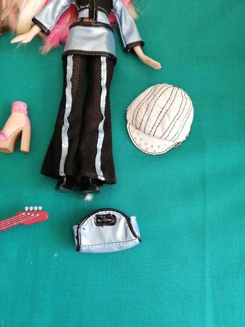 3 Bratz Dolls with some Accessories