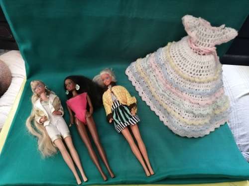 Three Barbie Dolls