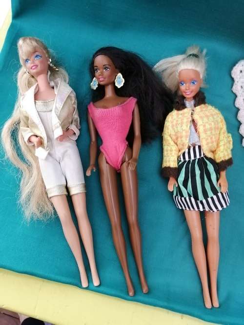 Three Barbie Dolls