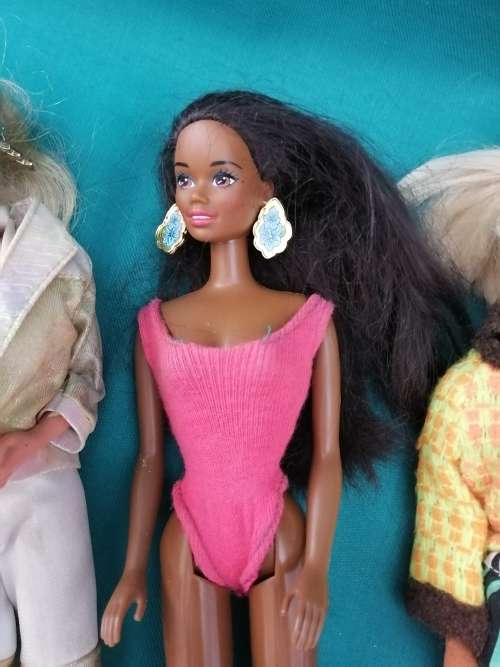 Three Barbie Dolls