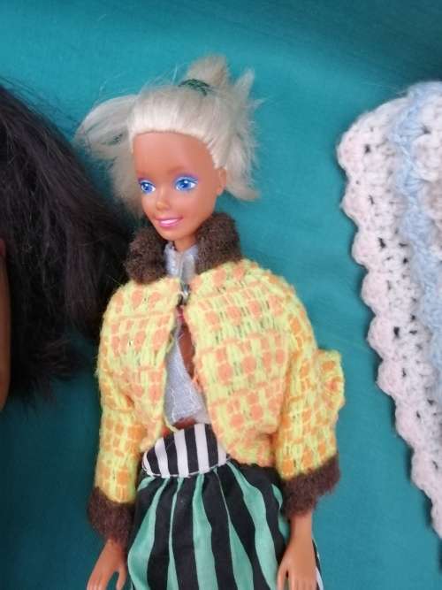 Three Barbie Dolls