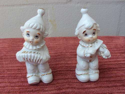 SET OF PORCELAIN CLOWNS  STARTING @ R1 !!