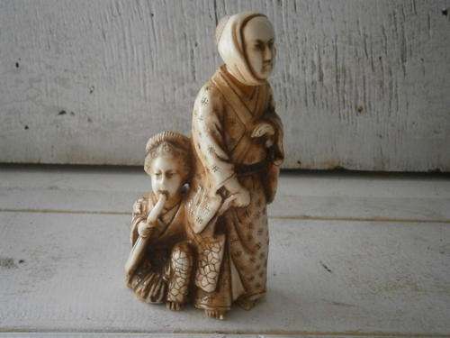 Oriental Woman and Child