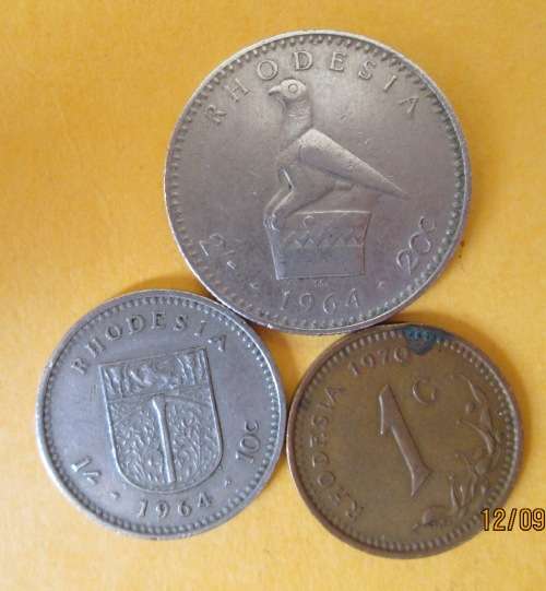 THREE RHODEASIAN COINS.....ONE BID FOR ALL......R1....R1....R1....R1