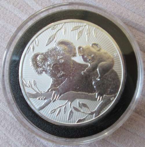 ( LOW START )..LARGE DOUBLE THICK  2oz  999.9%  PURE SILVER   AUSTRALIAN .KAOLA BEAR