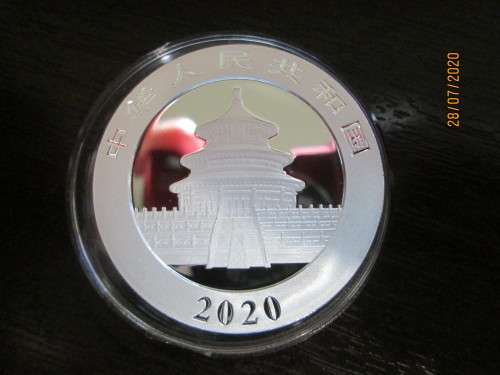 ( LOW START )  STUNNING    FAMOUS CHINESE PANDA   30GRAMS     999.9%  PURE SOLID SILVER