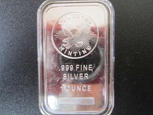 ( LOW START )   SUNSHINE  1oz  999.9%    PURE  SOLID SILVER BAR   CAPSULED....