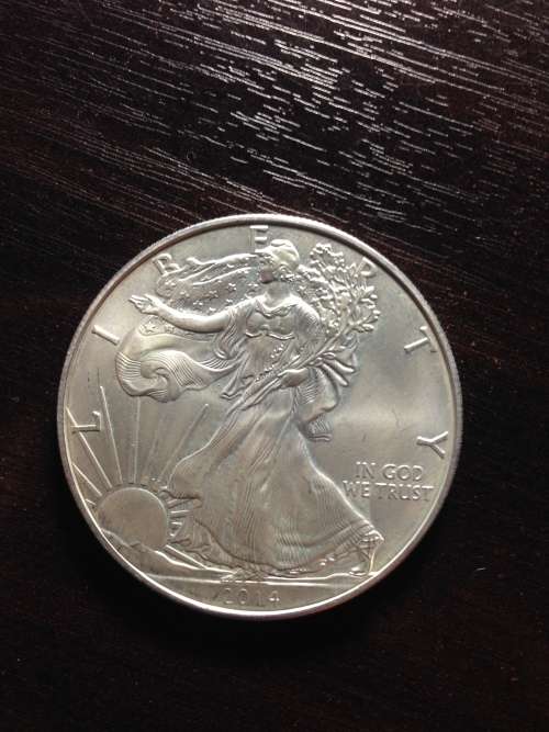 # PROMO #     2014   AMERICAN EAGLE    1oz...999.9%....PURE SOLID SILVER.....