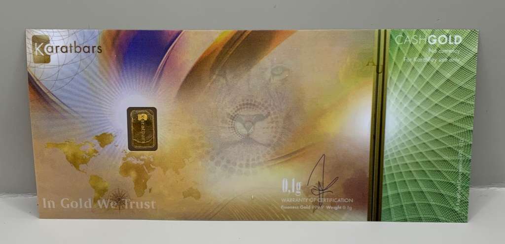 (   GIFT IN GOLD )     1/10th GRAM PURE GOLD   EMBEDED IN A  SPECIAL BANK NOTE