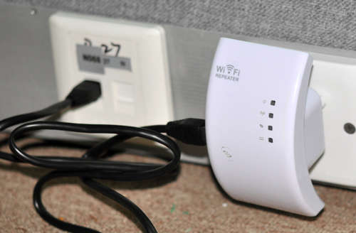 Wall Powered Wireless Signal Repeater and WiFi Access Point with WPS