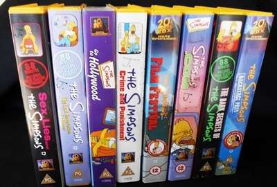 eight casettes  of the Simpsons on VHS casette