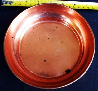 vintage red copper dish with rolled edge