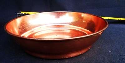 vintage red copper dish with rolled edge