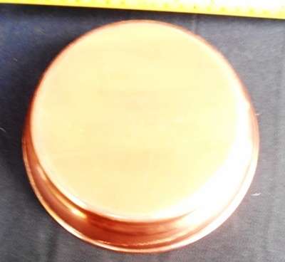 vintage red copper dish with rolled edge