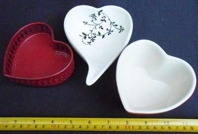 3 small white and red decorative heart shaped containers or sweet dishes
