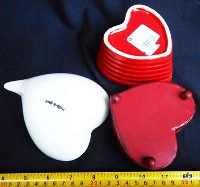 3 small white and red decorative heart shaped containers or sweet dishes