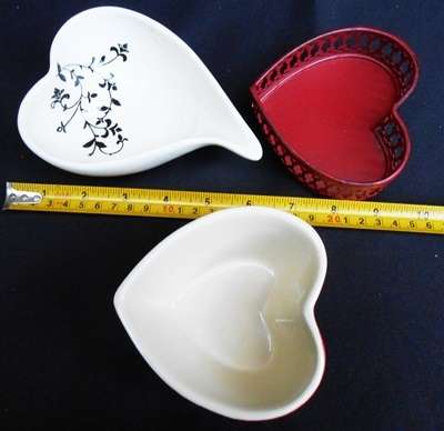 3 small white and red decorative heart shaped containers or sweet dishes