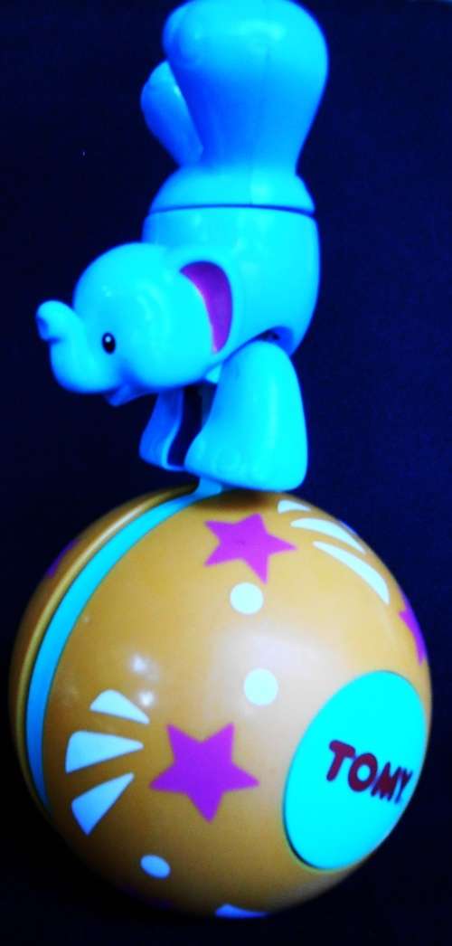 Baby toy by Tomy. Balancing ball with soft musical noise and moving elephant