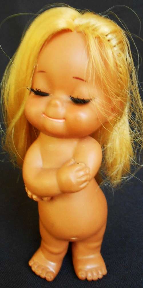 Vintage collectable IMPCO Sun Bunnies doll  sassy doll or hula doll hugging herself 1960 s