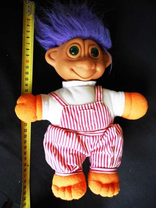 Collectable Troll doll with purple hair and soft body eyes light up