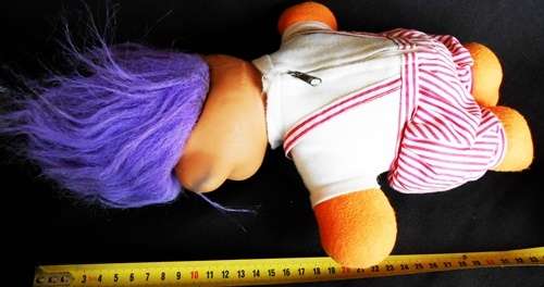 Collectable Troll doll with purple hair and soft body eyes light up