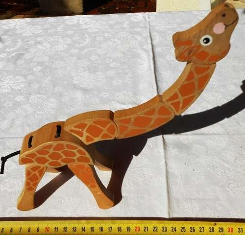 Melissa and Doug twist and change wooden giraffe toy