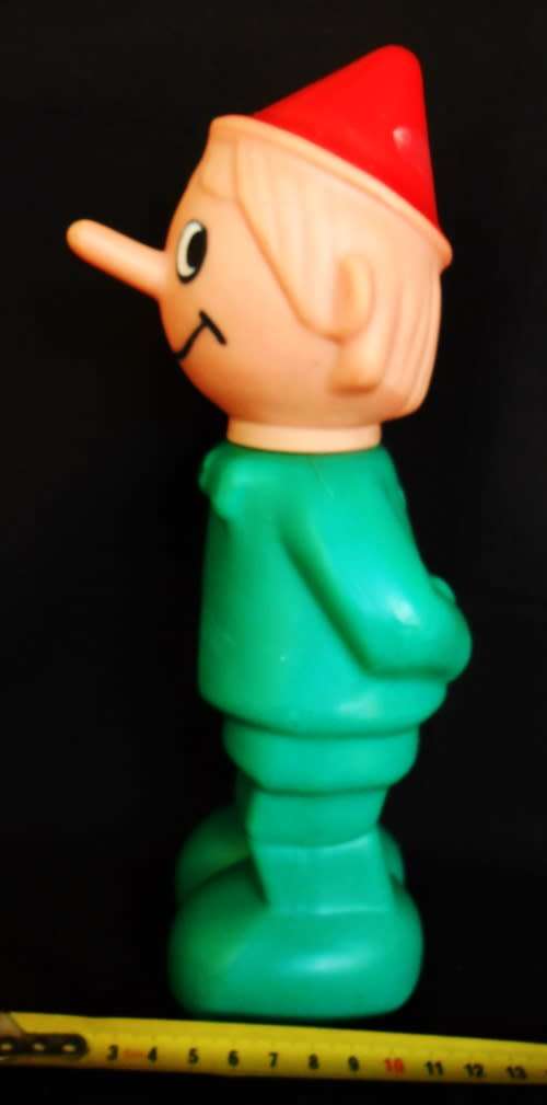 Pinocchio vintage hard plastic bottle