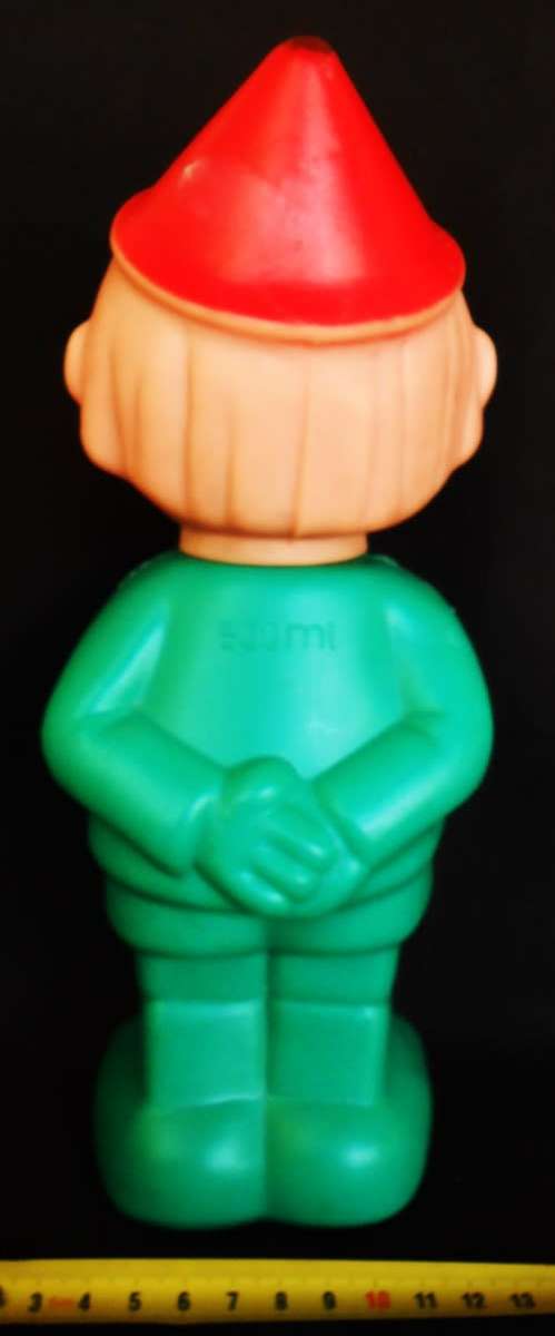 Pinocchio vintage hard plastic bottle