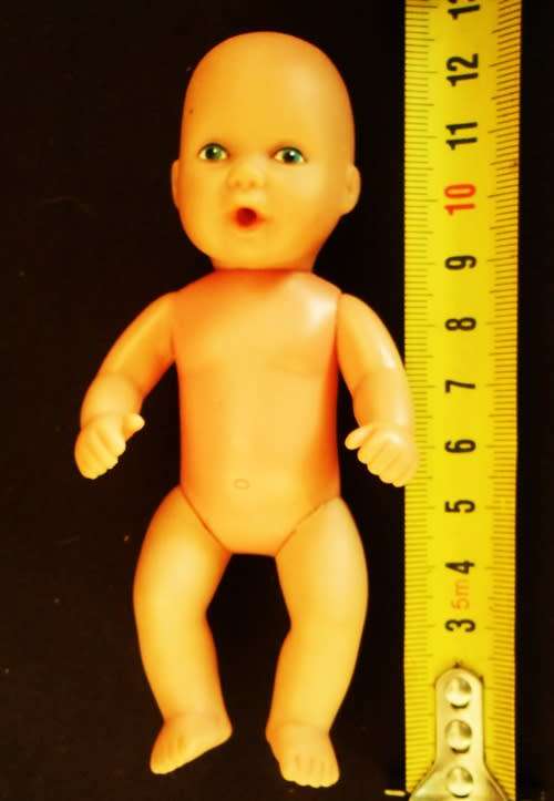 Baby Born Miniworld by Simba Mini doll in yellow dress