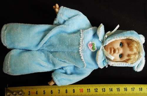 Small Porcelain doll in bunny suit. price reduced