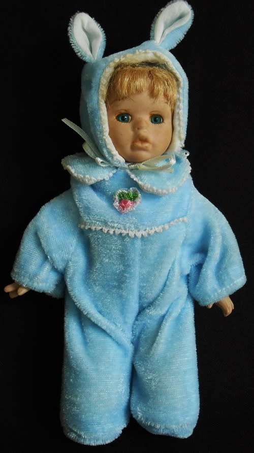 Small Porcelain doll in bunny suit. price reduced
