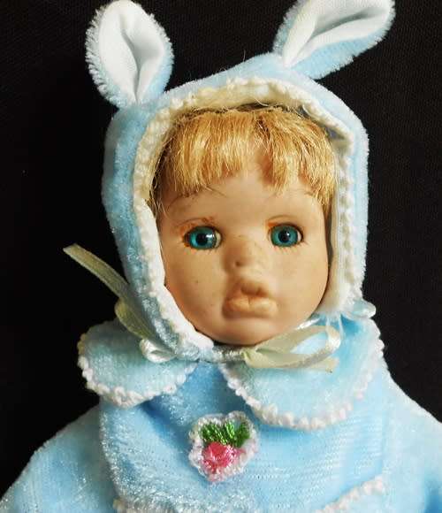 Small Porcelain doll in bunny suit. price reduced