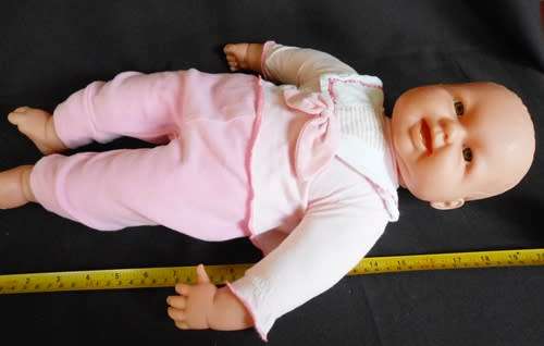 big soft bodied baby doll with brown eyes