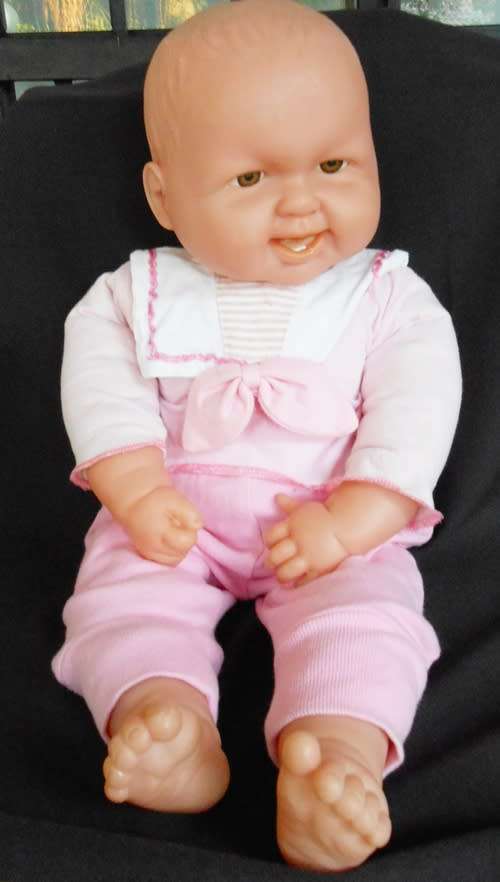 big soft bodied baby doll with brown eyes