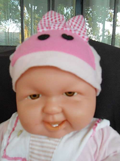 big soft bodied baby doll with brown eyes